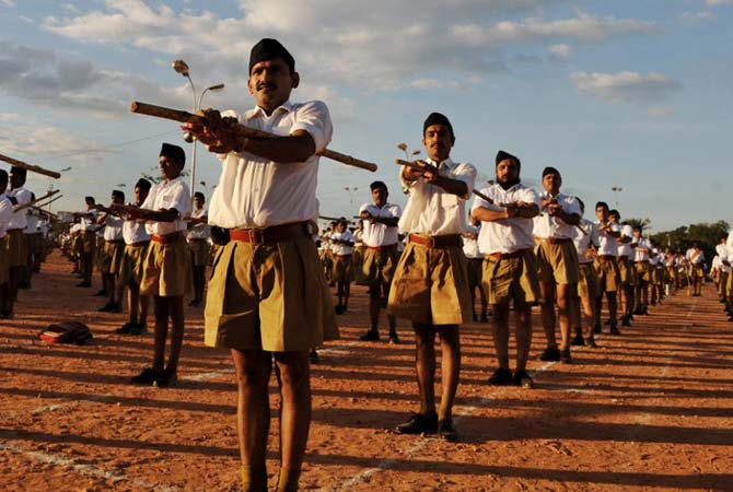 Members of Rashtriya Swayamsevak Sangh  National Volunteers Organisation- take part in a physical drill during a public meeting in Bangalore in 2009. Pic  AFP