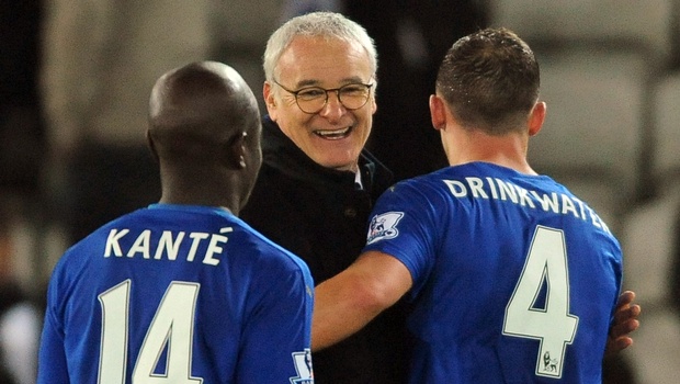 Leicester manager Claudio Ranieri congratulates Daniel Drinkwater right and Ngolo Kante left after the English Premier League soccer match between Leicester City and Newcastle United at the King Power Stadium in Leicester England Monday