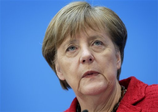 German Chancellor Angela Merkel attends a press conference after a party meeting at the headquarters of the German Christian Democratic Party in Berlin Germany Monday