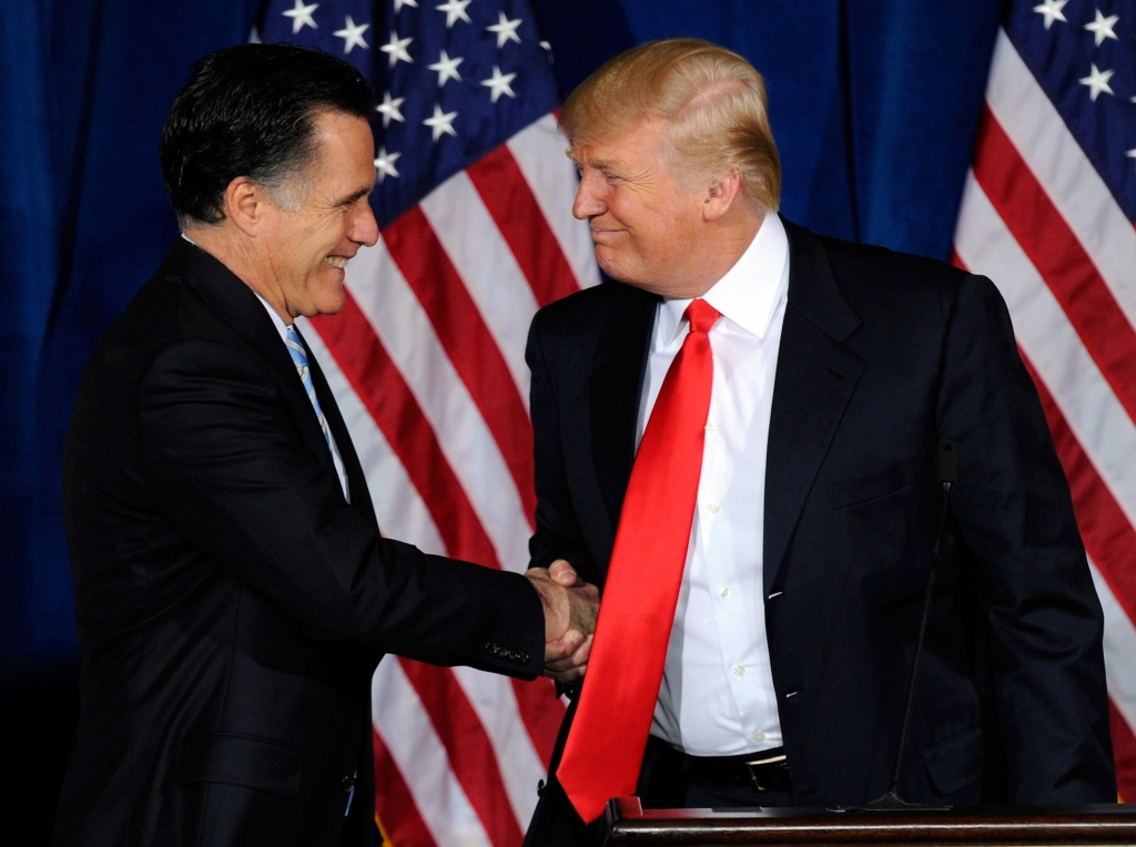 LAS VEGAS NV- FEBRUARY 02 Republican presidential candidate former Massachusetts Gov. Mitt Romney and Donald Trump shake hands during a news conference held by Trump to endorse Romney for president at the Trump International Hotel & Tower Las Veg