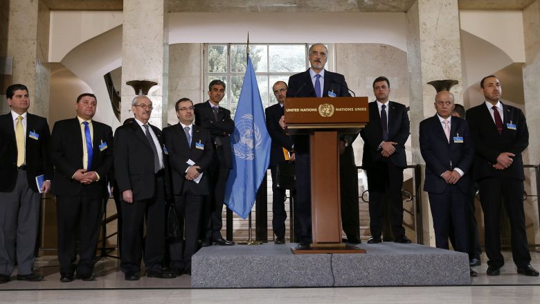 The Syrian government delegation headed by Bashar al Jaafari attended a news conference in Geneva on Wednesday. Al Jaafari said his government was not surprised by Russian withdrawal of its troops from Syria. REUTERS  Denis Balibouse