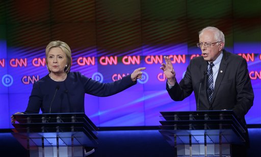 Democratic presidential candidates Hillary Clinton and Sen. Bernie Sanders I-Vt. argue a point during the Democratic presidential primary debate at the University of Michigan Flint on Sunday