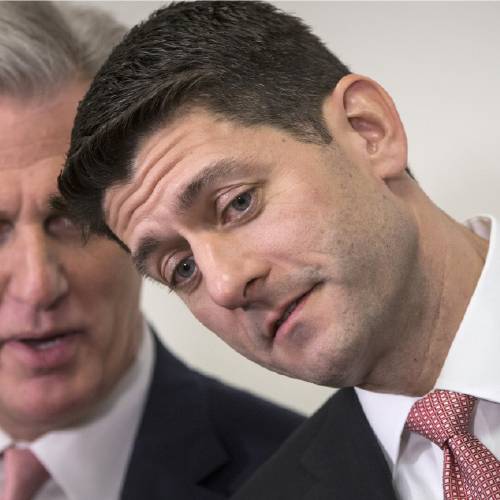 Paul Ryan of Wis. confers with House Majority Leader Kevin Mc Carthy of Calif. before a news conference on Capitol Hill in Washington Tuesday