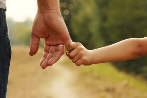 Child and parent hands