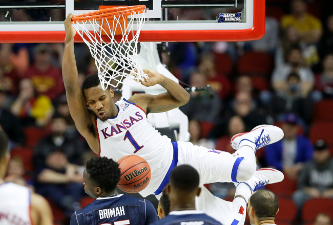 Kansas guard Wayne Selden Jr. dunks during the second half of a second-round men's college basketball game against Connecticut in the NCAA Tournament Saturday