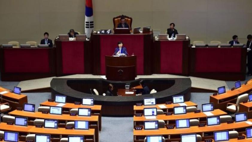 Some lawmakers and the parliament chair spotted dozing off during the marathon session