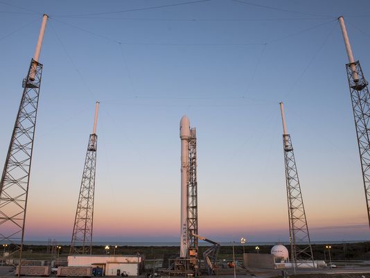 SpaceX's Falcon 9 rocket sits on a Cape Canaveral Air Force Station pad before a launch attempt on Sunday Feb. 28 2016