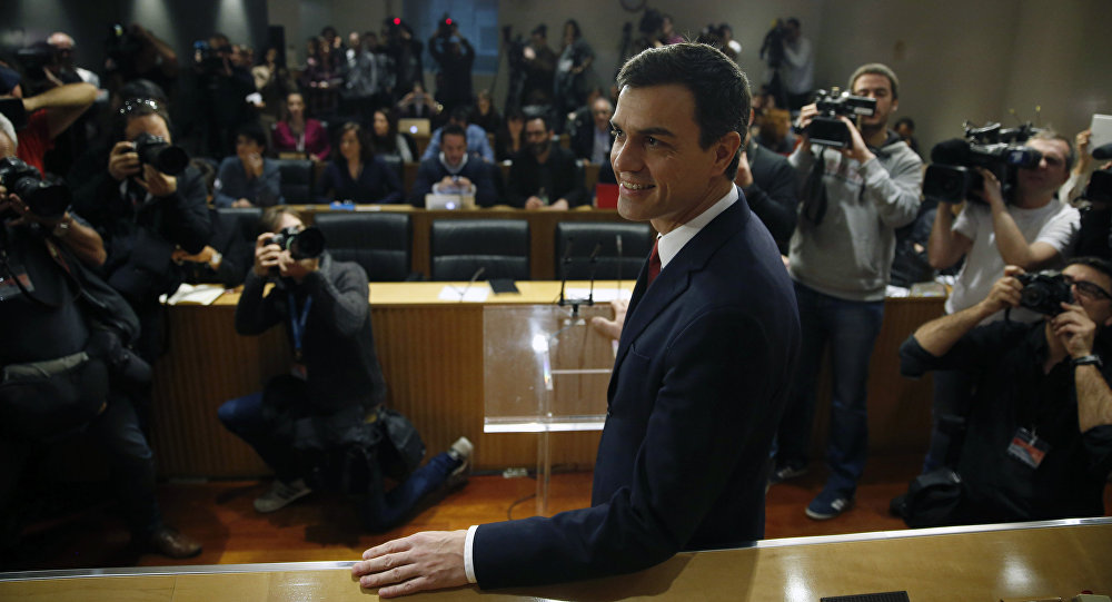 Spain's Socialist Party leader Pedro Sanchez poses before a news conference at Parliament in Madrid Spain