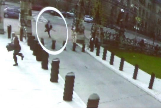 Michael Zehaf Bibeau is shown carrying a gun while running towards Parliament Hill in Ottawa on Wednesday Oct. 23 2014 in a still taken from video surveillance in this handout