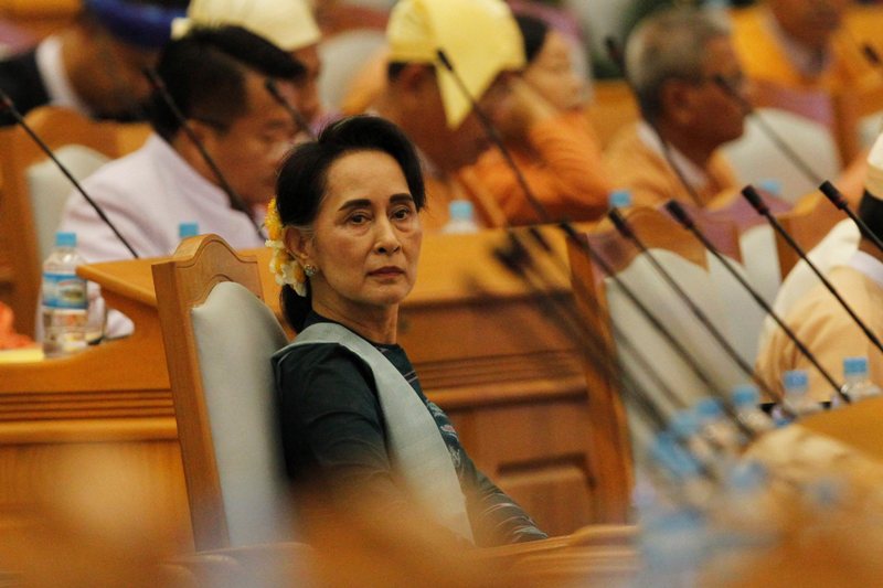 Myanmar's Suu Kyi to control government as party head