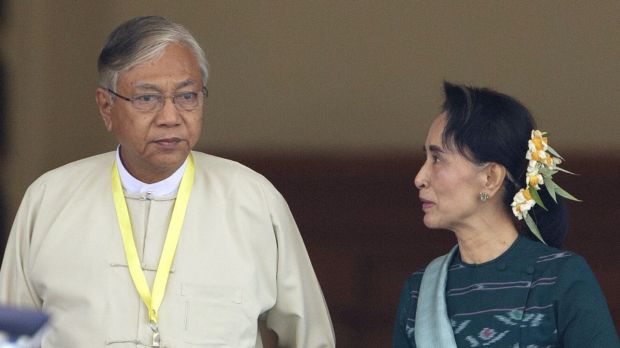 Htin Kyaw newly elected President of Myanmar walks with National League for Democracy leader Aung San Suu Kyi