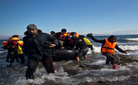 Syrian refugees arrive from the Turkish coast to the northeastern Greek island of Lesbos Oct 2015