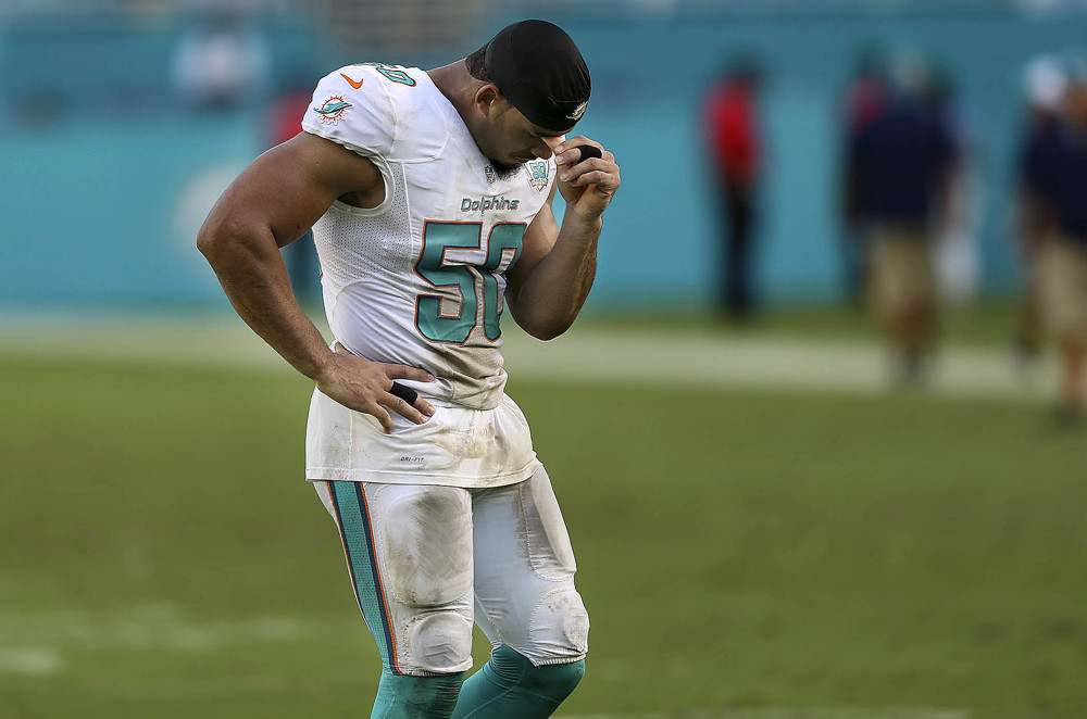 Nov. 22 2015- Miami Gardens Florida U.S.- Miami Dolphins defensive end Olivier Vernon, walks off the field dejected after the Dolphins loss to the visiting Dallas Cowboys during their NFL game Sunday Nov. 22 2015 at Sun Life Stadium in Miami G