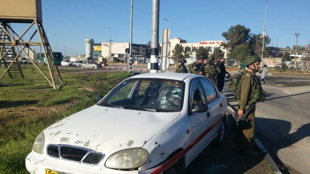 The scene of a suspected car-ramming attack at the Gush Etzion junction in the West Bank on Friday