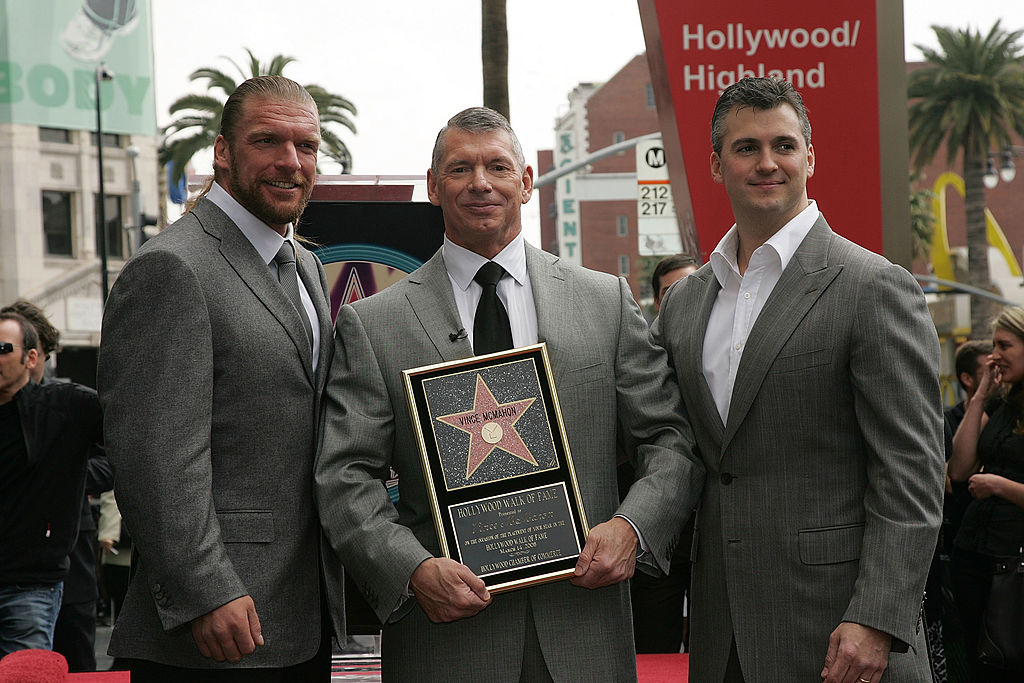 HOLLYWOOD- MARCH 14 Wrestling superstar Triple H and Shane Mc Mahon with Chairman of WWE Vince Mc Mahon attend a ceremony honoring him with a star on the Hollywood Walk of Fame at Hollywood and Highland