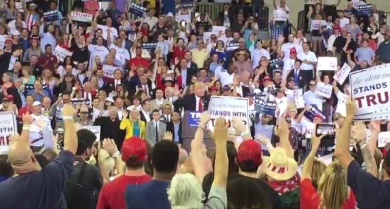 Trump supporters giving an oath reminding some of the Hitler salute