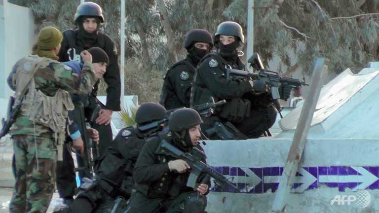 Tunisian special forces take position during clashes with militants in the southern town of Ben Guerdane near the Libyan border