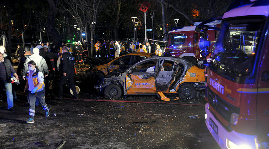 Emergency workers work at the explosion site in Ankara Turkey