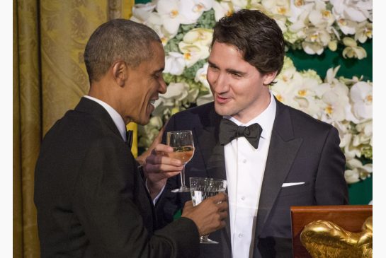 Prime Minister Justin Trudeau proposes a toast to US President Barack Obama during a state dinner at the White House Thursday