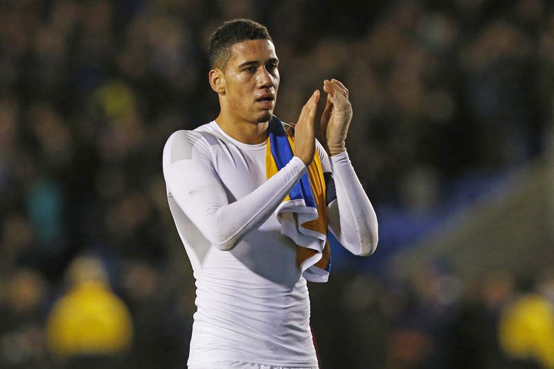 Manchester United's Chris Smalling applauds fans at the end of their game with Shrewsbury Town in the FA Cup Fifth Round