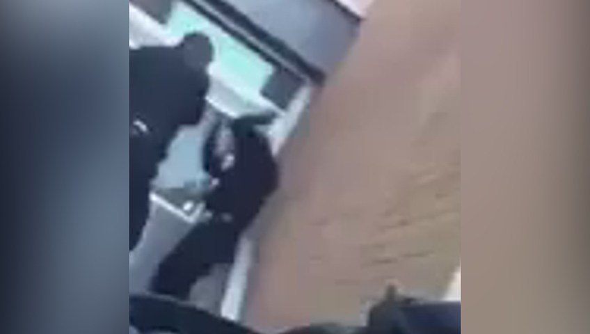 Video appears to show officer hitting, kicking young man