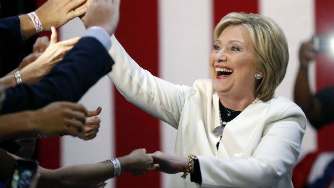 Democratic presidential candidate Hillary Clinton reacts to supporters as she arrives to address supporters at her Super Tuesday election night rally in Miami