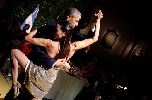 President Barack Obama dances tango during a state dinner hosted by Argentina's President Mauricio Macri at the Centro Cultural Kirchner as part of President Obama's two-day visit to Argentina in Buenos Aires