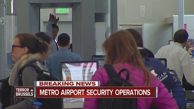 With security still high at Metro Airport officials have not increased the threat level in the wake of the Brussels attacks.                      WXYZ