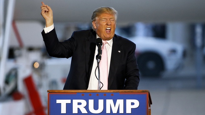 Republican presidential candidate Donald Trump holds a plane-side rally in a hanger at Youngstown Warren Regional Airport in Vienna Ohio Monday