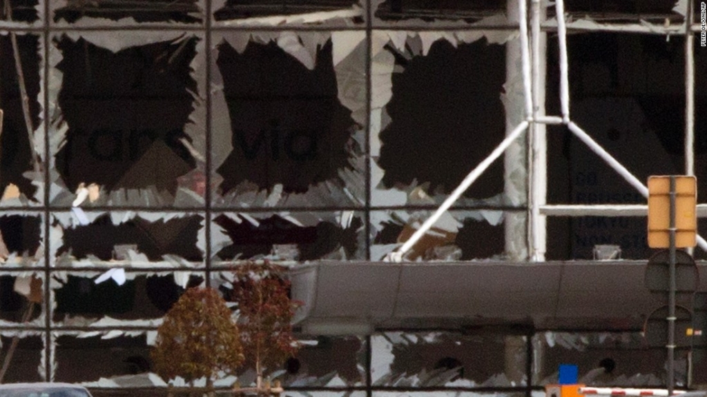 The blown-out windows of the airport are seen after the deadly attacks