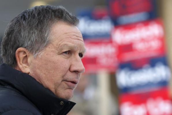 John Kasich visits a polling station at