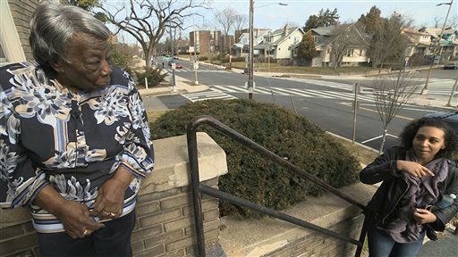 This frame garb from video shows Virginia McLaurin left in Washington Monday Feb. 22 2016. At 106 years old shes seen more than a dozen presidents come and go but Virginia Mc Laurin says she can finally die happy after meeting President Barack Oba