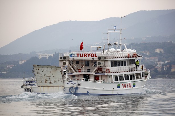 A boat carrying migrants to Turkey leave from Greece.                       Giorgos Moutafis  Reuters