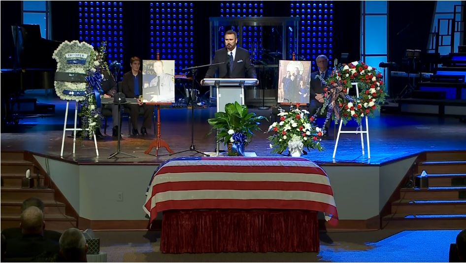 A funeral service held for Trooper Chad Dermyer at Liberty Baptist Church in Hampton Va