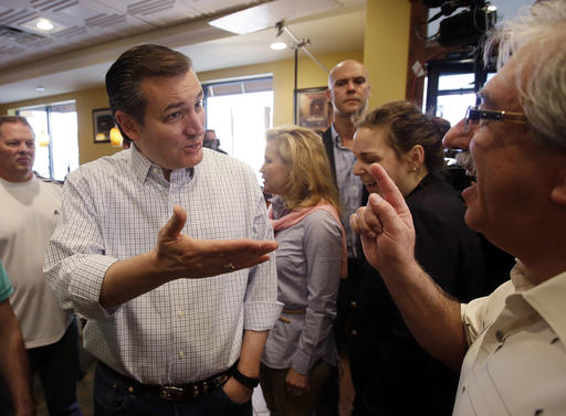 Republican presidential candidate Sen. Ted Cruz R Texas speaks with Dimitri Adamopoulos during a campaign stop at Sister's Place Restaurant Wednesday