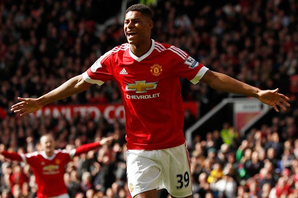 Marcus Rashford celebrates after scoring the first goal for Manchester United