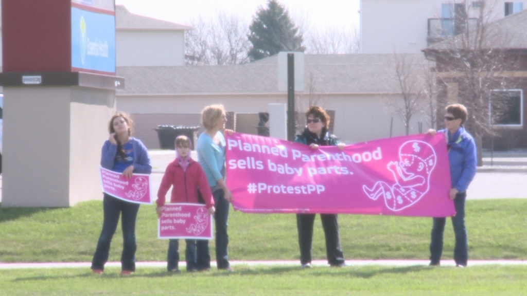 Those against Planned Parenthood are continuing their series of protests outside the clinic in Moorhead for their first annual nationwide protest