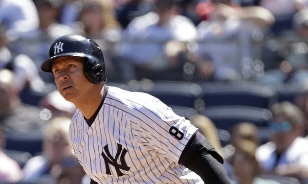 New York Yankees designated hitter Alex Rodriguez hits an RBI double during the fourth inning of a baseball game against the Tampa Bay Rays Sunday