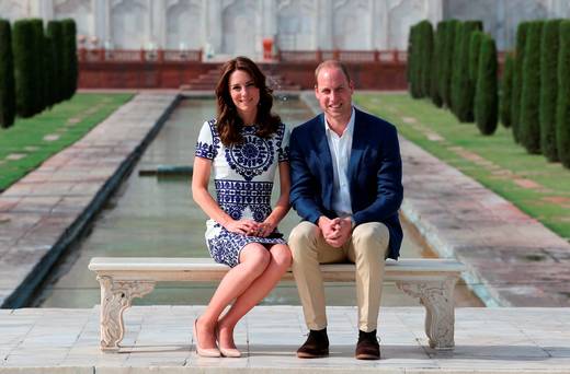 Prince William Duke of Cambridge and Catherine Duchess of Cambridge sit in front of the Taj Mahal during day seven of the royal tour of India and Bhutan