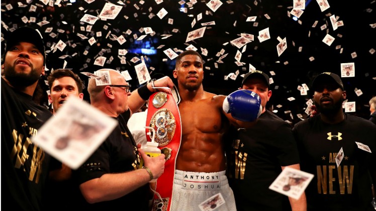 Anthony Joshua beats Charles Martin to win IBF world title