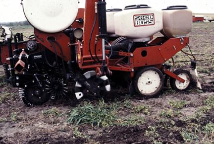 Report: Kansas wheat heading, corn planting makes progress