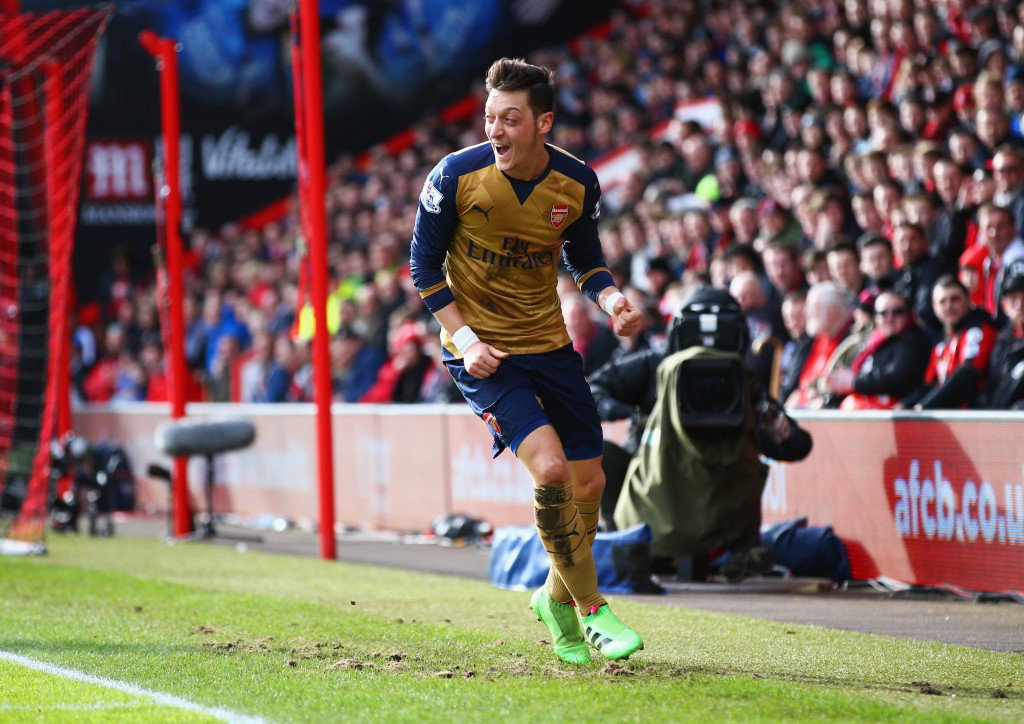 BOURNEMOUTH ENGLAND- FEBRUARY 07 Mesut Oezil of Arsenal celebrates as he scores their first goal during the Barclays Premier League match between A.F.C. Bournemouth and Arsenal at the Vitality Stadium