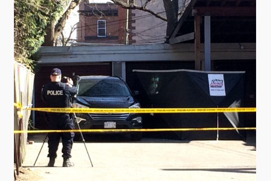 Toronto police cordoned off the area behind Charlie's Meat Factory on Broadview Ave. on Tuesday after an employee found a bag containing what appeared to be human remains