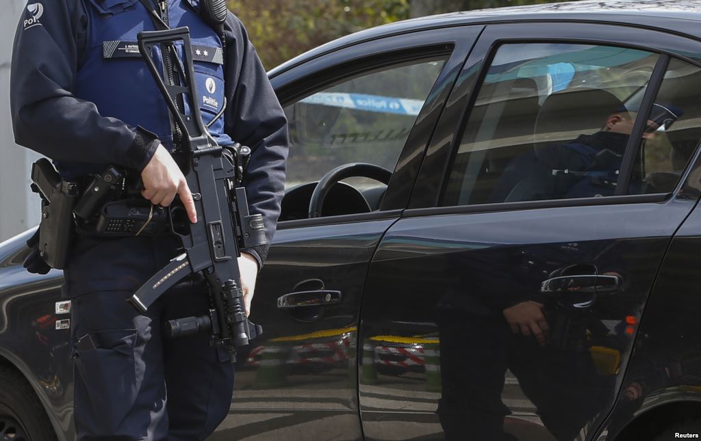 A Belgian police officer controls the access to Belgian international airport of Zaventem airport which is still not operating more than a week after the attacks in Brussels metro and the airport in Zaventem Belgium