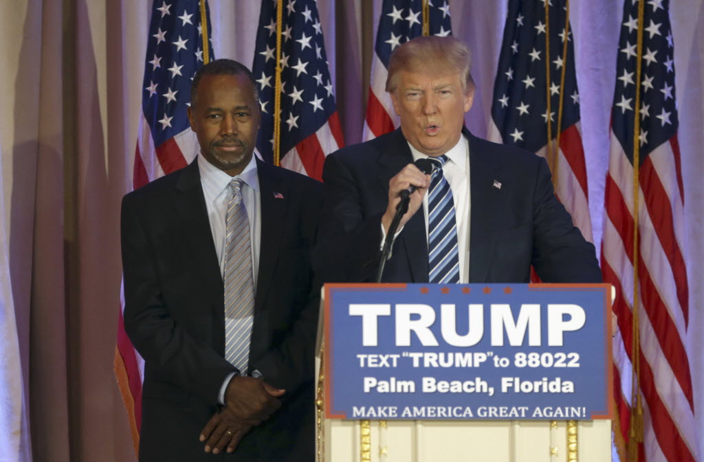 Ben Carson left and Donald Trump in Florida