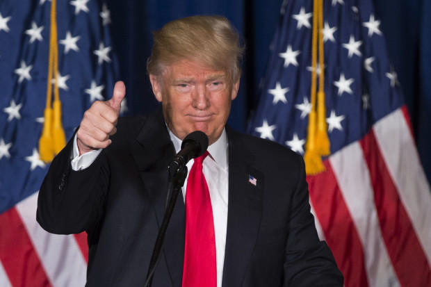 Republican presidential candidate Donald Trump gives a thumbs up after giving a foreign policy speech at the Mayflower Hotel in Washington. He’s become one of the most closely scrutinized people on earth