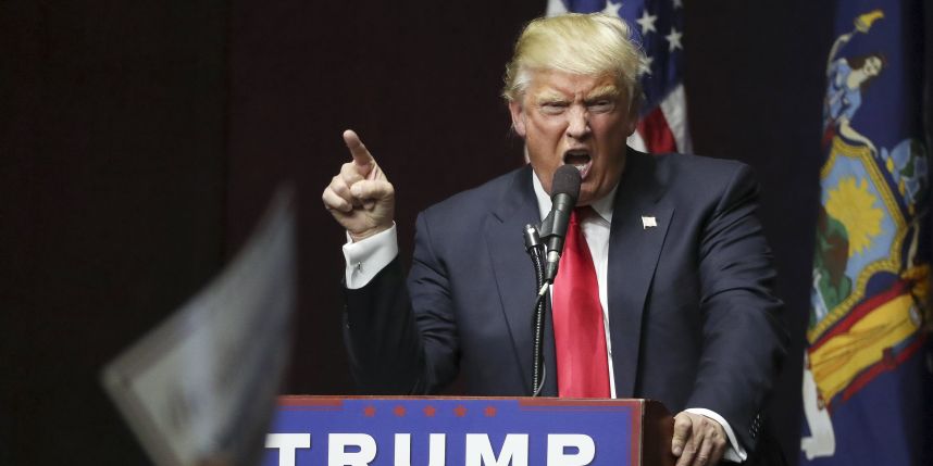 Trump under fire on many fronts expands campaign team