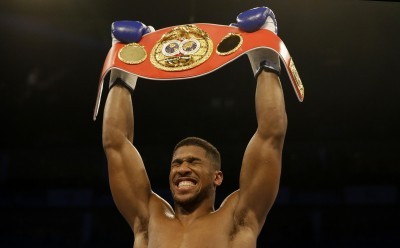 Anthony Joshua beats Charles Martin to win IBF world title