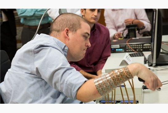 A'neural bypass system allows Ian Burkhart who is quadriplegic to use his hand and arm again. A computer chip in Burkhart's brain reads his thoughts decodes them then sends signals to a sleeve on his arm that allows him to move his hand