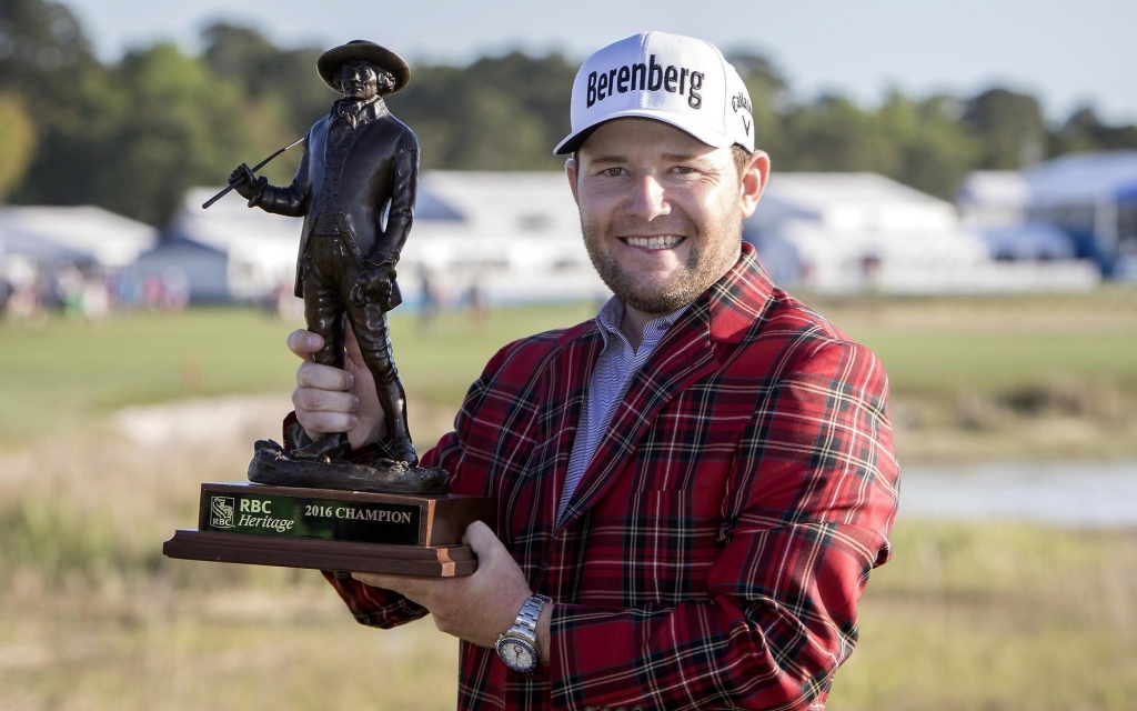 Branden Grace holds the RBC Championship trophy after winning the RBC Heritage on Sunday